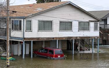 CALIFORNIA, UNITED STATES - MARCH 21: Buildings and vehicles are partially submerged after levee fails in Manteca of San Joaquin County as atmospheric river storms hit California, United States on March 21, 2023. (Photo by Tayfun Coskun/Anadolu Agency via Getty Images)