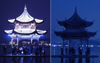 HANGZHOU, CHINA - MARCH 25, 2023 - Photo taken on March 25, 2023 shows the Jixian Pavilion (left) and the Jixian Pavilion (right) before the lights were turned off at the West Lake scenic spot in Hangzhou, Zhejiang province, China. "Earth Hour" is the world's largest open source environmental protection action initiated by the World Wide Fund for Nature. It advocates that individuals, businesses and governments turn off the lights for one hour on the last Saturday of March every year from 8:30 PM to 9:30 PM to express their concern about climate change and support for sustainable development. The theme of this year's Earth Hour is "Give an Hour for Earth." (Photo by CFOTO/Sipa USA)