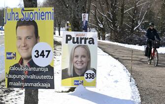 Election posters of The Finns Party and its leader Riikka Purra (R) are displayed in Espoo, Finland, on March 29, 2023, ahead of the Finnish 2023 parliamentary elections on April 2, 2023. (Photo by Heikki Saukkomaa / Lehtikuva / AFP) / Finland OUT (Photo by HEIKKI SAUKKOMAA/Lehtikuva/AFP via Getty Images)