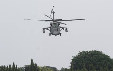 JAKARTA, INDONESIA - NOVEMBER 4: S-70 Black Hawk helicopter of the Royal Brunei Air Force performs a demonstration flight during the Indo Defence 2022 Expo & Forum defense industry exhibition at the Halim Perdana Kusumah Airbase in Jakarta, Indonesia on 4 November 2022. At least 905 companies from 59 countries will take part in the event The Indo Defence 2022 Expo & Forum with the theme 'Peace, Prosperity, Strong'. (Photo by Eko Siswono Toyudho/Anadolu Agency via Getty Images)