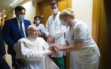 July 11, 2021 : Pope Francis speaks with a doctor at the Gemelli Hospital, in Rome, where he is recovering from colon surgery