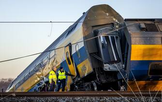 Voorschoten - Emergency services at work at a derailed night train.  The passenger train collided with construction equipment on the track.  One person died and several people were seriously injured.  A freight train was also involved in the accident.  ANP REMKO DE WAAL netherlands out - belgium out(Photo by Remko de Waal/ANP/Sipa USA)