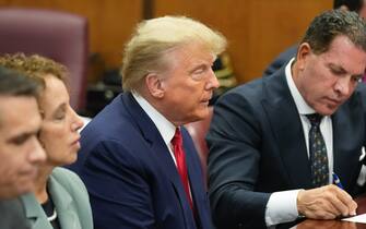 Former President Donald Trump appears in court for his arraignment, Tuesday, April 4, 2023, in New York.  Trump surrendered to authorities ahead of his arraignment on criminal charges stemming from a hush money payment to a porn actor during his 2016 campaign.  (AP Photo/Seth Wenig, Pool)