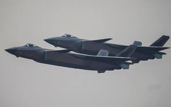 A pair of Chengdu J-20 aircrafts perform during the 13th China International Aviation and Aerospace Exhibition in Zhuhai, Guangdong province, China, 28 September 2021. ANSA/ALEX PLAVEVSKI
