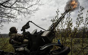 An Ukrainian serviceman of 57th Otaman Kost Hordiienko Separate Motorized Infantry Brigade fires 2s1 "Gvozdyka" self-propelled howitzers at an undisclosed position near the outskirts of Bakhmut, Donetsk region, Ukraine, 07 April 2023. Russian troops entered Ukrainian territory on 24 February 2022, starting a conflict that has provoked destruction and a humanitarian crisis. ANSA/OLEG PETRASYUK