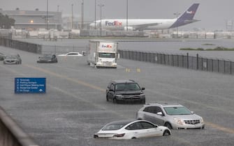 epa10571673 Several cars are stuck in flood water on Fort Lauderdale International Airport's West Perimeter road in Fort Lauderdale, Florida, USA, 13 April 2023. Heavy rains in the past days produced flooding in the lower areas of the Miami-Dade and Broward counties.  EPA/CRISTOBAL HERRERA-ULASHKEVICH