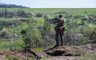 DONBAS REGION, UKRAINE - APRIL 26: Ukrainian soldiers from the 28th Brigade practice firing their AK-47 assault rifles and RPGs (rocket-propelled grenades), as Ukrainian Armed Forces units train for a critical and imminent spring counteroffensive against Russian troops, which invaded 14 months earlier, in the Donbas region, Ukraine, on April 26, 2023. Bolstered by billions of dollars worth of American and European military and economic support, Ukrainian forces are aiming to retake significant territory captured by Russia last year, as well as parts of Crimea and the eastern Donbas region, where Russian troops and local allies seized control in 2014. The counteroffensive is critical for Ukraine to show U.S. and Western donors that it can win on the battlefield and reverse Russian gains, and so deserves continued support. (Photo by Scott Peterson/Getty Images)