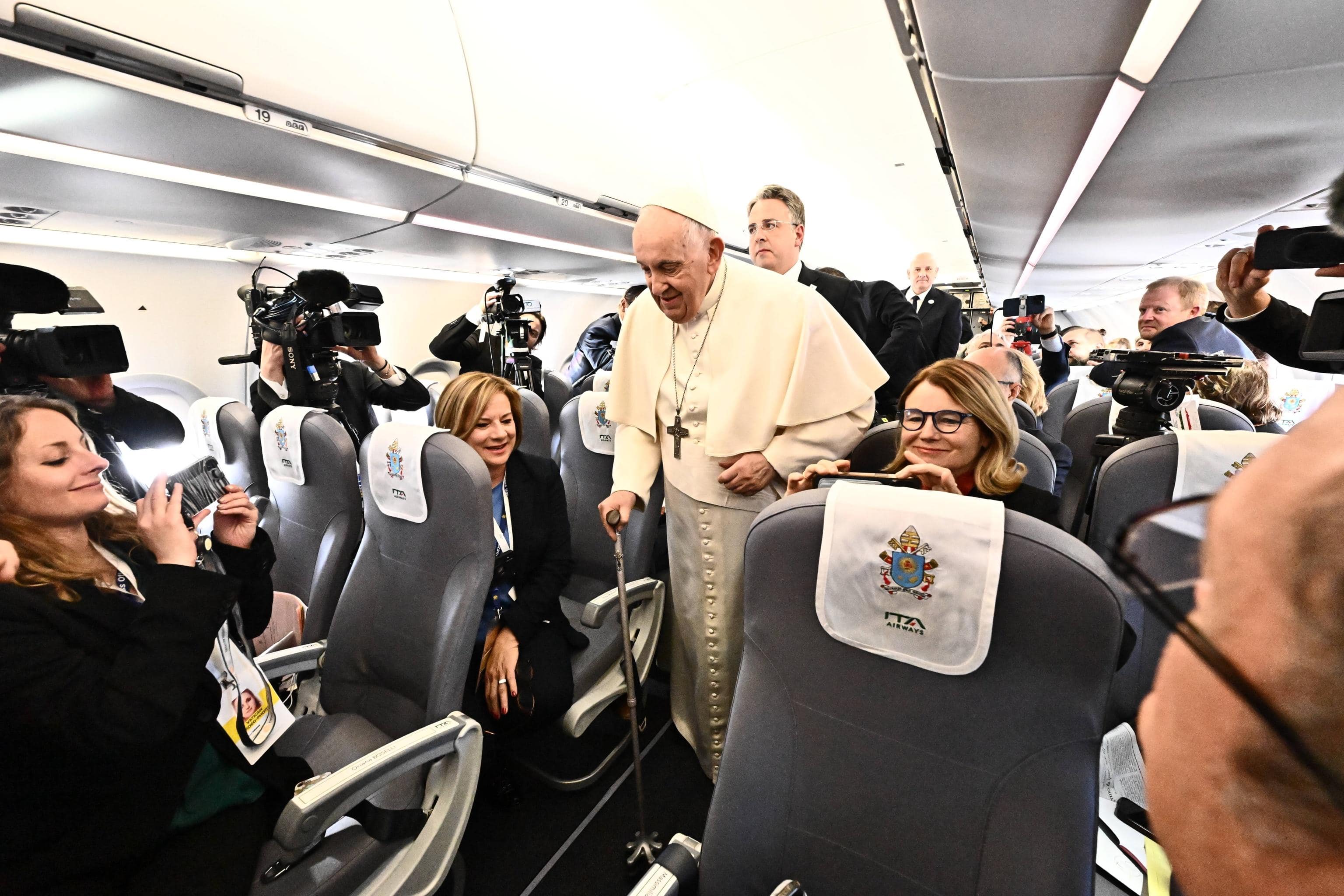 Pope Francis speaks to journalists aboard the airplane heading to Hungary, 28 April 2023. "Some stupid thing they did." With these words Pope Francis, during the flight to Budapest, defined the insinuations about John Paul II spread in recent days in relation to the case of Emanuela Orlandi. Pope Francis starts his three-day official visit to Hungary. 
ANSA/LUCA ZENNARO POOL