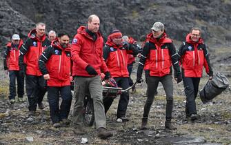 MERTHYR TYDFIL, WALES - APRIL 27: Prince William, Prince of Wales and Catherine, Princess of Wales take part in medical support exercises at the Central Beacons Mountain Rescue during day one of their visit to Wales on April 27, 2023 in Merthyr Tydfil, Wales. The Prince and Princess of Wales are visiting the country to celebrate the 60th anniversary of Central Beacons Mountain Rescue and to meet members of local communities. (Photo by Matthew Horwood - WPA Pool/Getty Images)