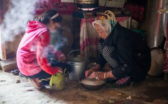 Kyrgyz nomadic family, near Karakol lake, Xinjiang, China