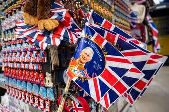 London, UK.  20 April 2023.  Coronation related souvenirs for sale in Oxford Street ahead of the coronation of King Charles III on 6 May.  Credit: Stephen Chung / Alamy Live News