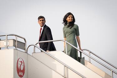 TOKYO, JAPAN - MAY 18: Prime Minister Rishi Sunak and his wife Akshata Murty boarding a plane in Tokyo, travelling to Hiroshima ahead of the G7 Summit on May 18, 2023 in Tokyo, Japan. The G7 summit will be held in Hiroshima from 19-22 May. (Photo by Stefan Rousseau - WPA Pool/Getty Images)