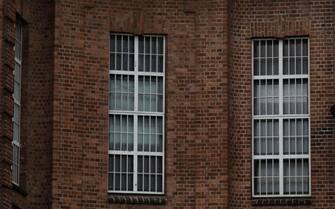 KIEL, GERMANY - JUNE 05: Windows of the JVA Kiel prison are seen on June 5, 2020 in Kiel, Germany.  German police have announced that Christian B., an inmate at the prison who is serving time on other charges and whom some publications have identified as Christian Brueckner, has become the main suspect in the disappearance of Madeleine McCann.  British citizen McCann, then a three-year-old, disappeared from a vacation resort in Portugal in 2007. Police have linked Christian B. to the case through another case of a missing girl as well as his having been in the same town in Portugal at the time Madeleine disappeared.  (Photo by Morris MacMatzen/Getty Images)