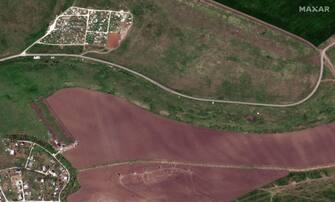 RUSSIANS INVADE UKRAINE -- APRIL 29, 2022: Maxar satellite imagery of the Vynohradne Cemetery and self propelled artillery nearby -- Mariupol, Ukraine.  Sequence -- 11 of 12 images.  20Apr2022_WV3.  Please use: Satellite image (c) 2022 Maxar Technologies.