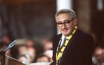 (dpa files) - Henry Kissinger speaks during the award ceremony of the Charlemagne Prize in Aachen, West Germany, 28 May 1987. Kissinger, born as Heinz Alfred Kissinger on 27 May 1923 in Fuerth, Germany, came to the United States in 1938 with his family. He served in the Army and studied at Harvard University, where he then served on the faculty from 1954-71. In the Nixon administration, Kissinger served as the president's National Security Advisor and then Secretary of State. Kissinger was the go-between in the secret negotiations that eventually opened relations between the U.S. and communist China. He was awarded the Nobel Peace Prize in 1973 for his role in arranging a ceasefire in North Vietnam. Kissinger continues to write, lecture and comment on television about foreign affairs. (Photo by Wüstmann/picture alliance via Getty Images)
