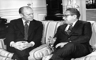 United States President Gerald R. Ford, left, meets US Secretary of State Henry A. Kissinger in the Oval Office of the White House in Washington, DC on  February 19, 1975. Kissinger was reporting on his just-completed ten day trip to the Middle East that included stops in Egypt and Israel.  Kissinger later told reporters that he believed Syria to be the only stumbling block to peace in the region and reiterated his belief there would be a settlement in the disputes.
Credit: Benjamin E. "Gene" Forte - CNP