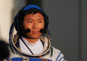 epa10662666 Payload expert Gui Haichao attends a seeing-off ceremony before boarding for the launch of the Long March-2F carrier rocket with a Shenzhou-16 manned space flight at the Jiuquan Satellite Launch Centre, in Jiuquan, Gansu province, China, 30 May 2023. The Shenzhou-16 manned space flight mission will transport three Chinese astronauts to the Tiangong space station.  EPA/ALEX PLAVEVSKI