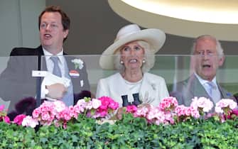 ASCOT, ENGLAND - JUNE 20: (LR) Tom Parker Bowles, Queen Camilla and King Charles III watch a race during day one of Royal Ascot 2023 at Ascot Racecourse on June 20, 2023 in Ascot, England.  (Photo by Chris Jackson/Getty Images)