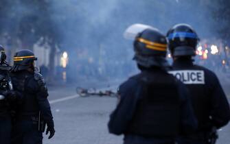 epa10719841 Riot police during clashes after a  demonstration in memory of 17-year-old Nahel who was killed by French Police in Marseille, France, 30 June 2023. Violence broke out all over France after police fatally shot a 17-year-old teenager during a traffic stop in Nanterre on 27 June.  EPA/Sebastien Nogier