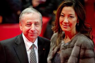 epa04062787 Former French racecar driver and Ferrari Formula One teamboss Jean Todt and his partner Malayan actress Michelle Yeoh arrive for the screening of 'The Monuments Men' during the 64th annual Berlin Film Festival, in Berlin, Germany, 08 February 2014. The movie is presented out of competition at the Berlinale, which runs from 06 to 16 February.  EPA/DANIEL NAUPOLD