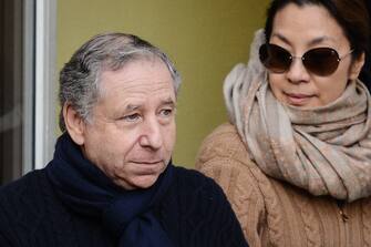 epa04005372 President of the Federation Internationale de l'Automobile (FIA) Jean Todt (L) and his wife, actress Michelle Yeoh, leave the 'Centre Hospitalier Universitaire' (CHU) hospital in Grenoble, near the French Alps, France, 01 January 2014 Sabine Kehm, manager of retired Formula One German racing driver Michael Schumacher, said Schumacher's condition was stable and has not changed since doctors said he showed small signs of improvement.  Schumacher, who turns 45 on 03 January, suffered critical head injuries when he fell and struck a rock Sunday while skiing.  EPA/DAVID EBENER