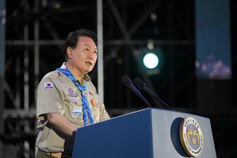 epa10782136 A handout photo made available by the South Korean presidential office shows South Korean President Yoon Suk Yeol delivers a welcoming speech during the opening ceremony of the 25th World Scout Jamboree in Saemangeum, about 180 km southwest of Seoul, South Korea late 02 August 2023. EPA/South Korean presidential office HANDOUT SOUTH KOREA OUT HANDOUT EDITORIAL USE ONLY/NO SALES