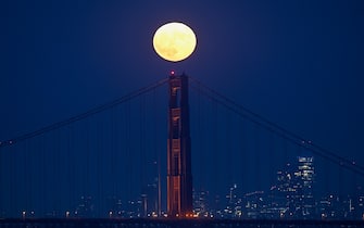 SAN FRANCISCO, CALIFORNIA - AUGUST 30: Super moon known as 'Blue Moon' rises over the Golden Gate Bridge in San Francisco, California, United States on August 30, 2023. (Photo by Tayfun Coskun/Anadolu Agency via Getty Images)