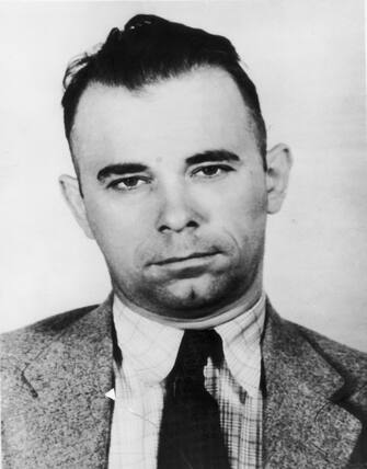 circa 1934:  American bank robber John Dillinger (1903 - 1934), whose exploits throughout the depression hit mid-west earned him the title 'Public Enemy Number One'.  (Photo by Hulton Archive/Getty Images)