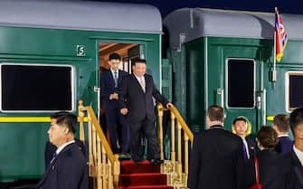 KHASAN, RUSSIA - SEPTEMBER 12 : (----EDITORIAL USE ONLY â   MANDATORY CREDIT - 'PRIMORSKY KRAI / HANDOUT' - NO MARKETING NO ADVERTISING CAMPAIGNS - DISTRIBUTED AS A SERVICE TO CLIENTS----) North Korea's leader Kim Jong Un walks out of his train after arriving at the North Korea-Russia border in Khasan, some 125 km south of Vladivostok, Russia, 12 September 2023.  (Photo by Primorsky Krai APS/Anadolu Agency via Getty Images)
