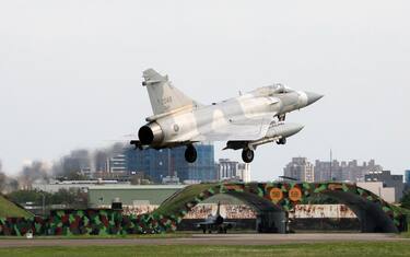 TOPSHOT - A Taiwanese air force Mirage 2000 fighter jet lands at an air force base in Hsinchu, northern Taiwan on April 9, 2023. - China was conducting a second day of military drills around Taiwan on April 9, in what it has called a "stern warning" to the self-ruled island's government following a meeting between its president and the US House speaker. (Photo by Jameson WU / AFP) (Photo by JAMESON WU/AFP via Getty Images)