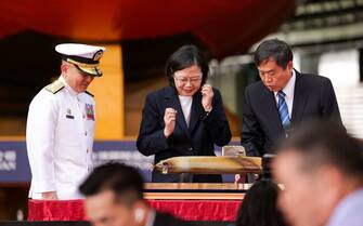 Tsai Ing-wen, Taiwan's president, center, during an unveiling event for the Taiwan Navy's Hai Kun submarine at CSBC Corp.'s dockyard in Kaohsiung, Taiwan, on Thursday, Sept. 28, 2023. Taiwan unveiled a prototype of its first submarine assembled at home as it prepares to stave off a potential invasion by China, a feat only made possible with the secretive help of other countries. Photographer: I-Hwa Cheng/Bloomberg via Getty Images