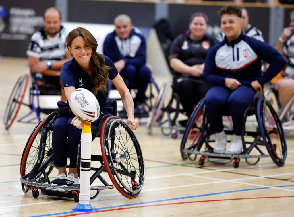 HULL, UNITED KINGDOM - OCTOBER 05: (EMBARGOED FOR PUBLICATION IN UK NEWSPAPERS UNTIL 24 HOURS AFTER CREATE DATE AND TIME) Catherine, Princess of Wales takes part in a wheelchair rugby training session, facilitated by members of the world-cup winning England Wheelchair Rugby League squad, during a Rugby League Inclusivity Day at Allam Sports Centre on October 5, 2023 in Hull, England. The Princess of Wales took part in the event as part of her role as Patron of the Rugby Football League and to see the positive impact the Disability Rugby League has on its participants and their families. (Photo by Max Mumby/Indigo/Getty Images)