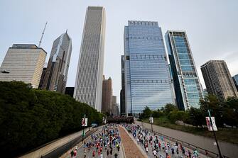 CHICAGO, ILLINOIS - OCTOBER 08: Runners compete in the 2023 Chicago Marathon at Grant Park on October 08, 2023 in Chicago, Illinois.  (Photo by Michael Reaves/Getty Images)
