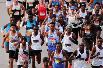 CHICAGO, ILLINOIS - OCTOBER 08: Professional men's and women's runners start the 2023 Chicago Marathon at Grant Park on October 08, 2023 in Chicago, Illinois.  (Photo by Michael Reaves/Getty Images)