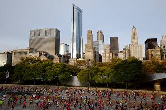 CHICAGO, ILLINOIS - OCTOBER 08: Runners compete in the 2023 Chicago Marathon at Grant Park on October 08, 2023 in Chicago, Illinois.  (Photo by Michael Reaves/Getty Images)