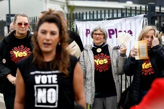 epa10918030 People watch on as Senator Lidia Thorpe speaks to media outside the voting center at Reservoir in Melbourne, Australia, 14 October 2023. Australians will participate in a historic referendum on 14 October to decide whether Indigenous people will be acknowledged in the country's constitution through the establishment of a new parliamentary advisory board.  EPA/CON CHRONIS AUSTRALIA AND NEW ZEALAND OUT