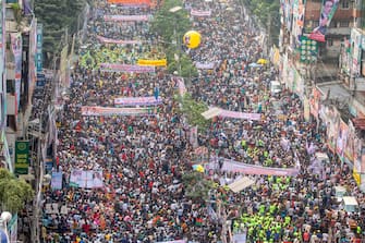 epa10925564 Supporters of the opposition Bangladesh Nationalist Party (BNP) walk during a rally near the party's Nayapaltan headquarters in Dhaka, Bangladesh, 18 October 2023. Thousands of Bangladesh Nationalist Party activists and party leaders joined the mass rally to demand the resignation of Bangladeshi Prime Minister Sheikh Hasina and the release of BNP chairperson Khaleda Zia.  EPA/MONIRUL ALAM