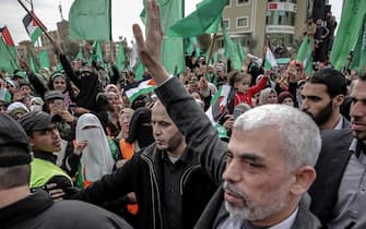 epa09065848 (FILE) - Hamas Gaza leader Yahya Al Sinwar (C) waves to supporters during a Hamas rally to mark the 31st anniversary of the group, in Gaza City, Gaza Strip, 16 December 2018 (reissued 10 March 2021).  Sinwar was re-elected as Gaza Hamas leader on 10 March 2021. EPA/MOHAMMED SABER *** Local Caption *** 54846862