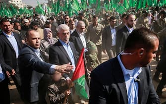 epaselect epa10365416 Gaza Hamas leader Yahya Al Sinwar (C) attends a rally to mark the 35th anniversary of Hamas in Gaza City, 14 December 2022. Hamas was founded in 1987, shortly after the Palestinian Intifada broke out against the Israeli occupation of the West Bank and Gaza.  EPA/HAITHAM IMAD