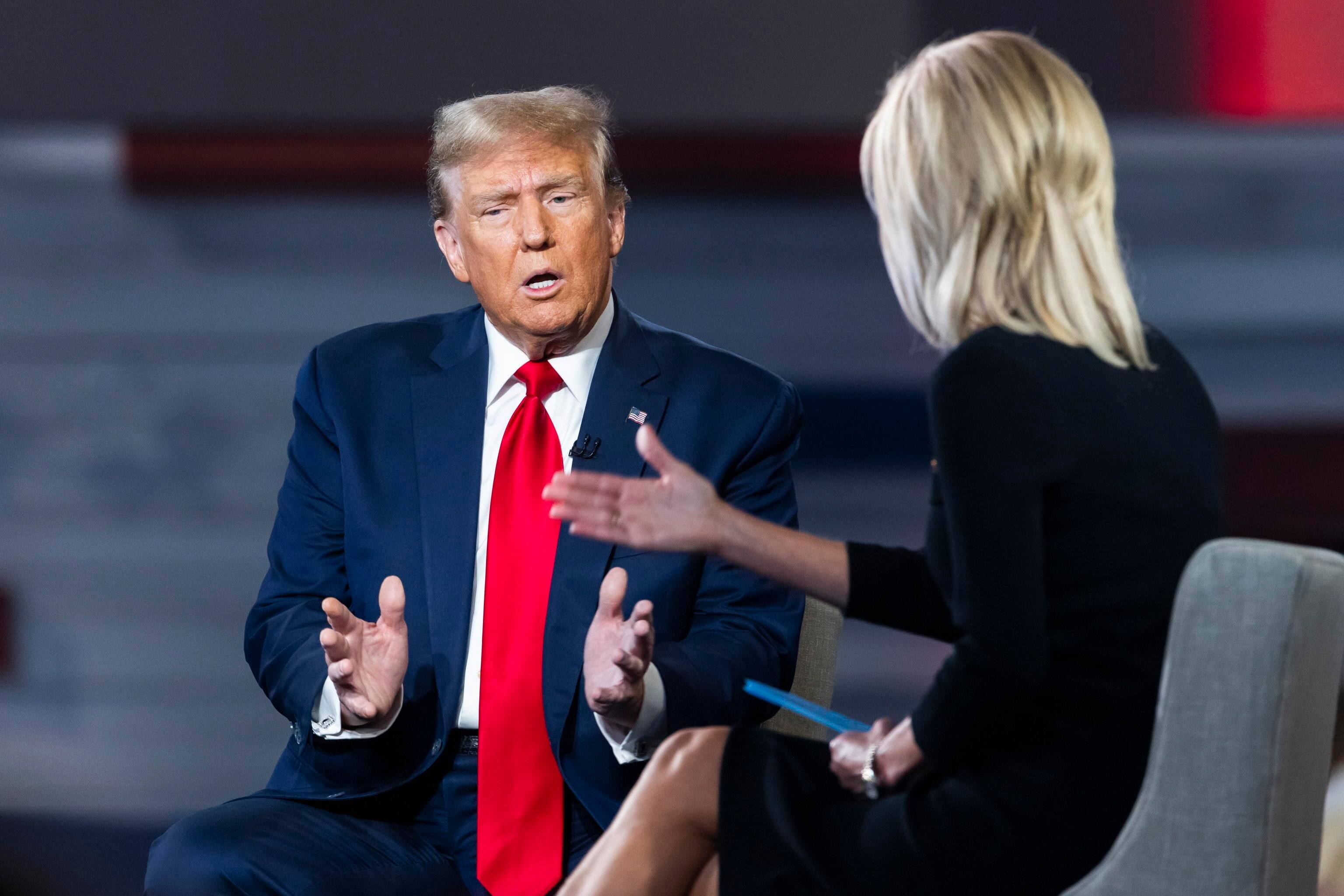 epa11168822 Former US President and current Republican presidential candidate Donald Trump (L) speaks to Fox News host Laura Ingraham (R) during a Fox News town hall in Greenville, South Carolina, USA, 20 February 2024.  Trump is running against former South Carolina governor Nikki Haley in the South Carolina Republican presidential primary, scheduled for 24 February 2024.  EPA/JIM LO SCALZO