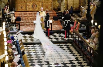 WINDSOR, UNITED KINGDOM - MAY 19:  Prince Harry and Meghan Markle exchange vows during their wedding ceremony in St George's Chapel at Windsor Castle on May 19, 2018 in Windsor, England. (Photo by Owen Humphreys - WPA Pool/Getty Images)