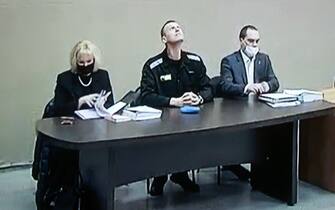 VLADIMIR REGION, RUSSIA – FEBRUARY 15, 2022: Pictured in this image is a monitor showing opposition activist Alexei Navalny (C) and lawyers Olga Mikhailova (L) and Vadim Kobzev during an on-site Lefortovo District Court hearing against Navalny at Penal Colony No. 2 in Pokrov, Vladimir Region. Navalny is facing the charges of contempt of court (in connection with his trial for defaming a WWII veteran) and large scale fraud. Sergey Fadeichev/TASS/Sipa USA