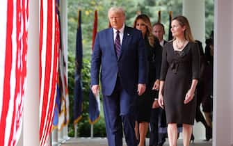 WASHINGTON, DC - SEPTEMBER 26: U.S. President Donald Trump (L) arrives to introduce 7th U.S. Circuit Court Judge Amy Coney Barrett as his nominee to the Supreme Court in the Rose Garden at the White House September 26, 2020 in Washington, DC. With 38 days until the election, Trump tapped Barrett to be his third Supreme Court nominee in just four years and to replace the late Associate Justice Ruth Bader Ginsburg, who will be buried at Arlington National Cemetery on Tuesday. (Photo by Chip Somodevilla/Getty Images)