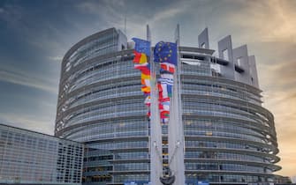 European flags in the wind, Louise-Weiss building, seat of the European Parliament in Strasbourg, France, Europe