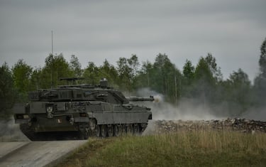 An Ariete Italian tank fires at its target, during the Strong Europe Tank Challenge (SETC), at the 7th Army Joint Multinational Training Command’s Grafenwoehr Training Area, Grafenwoehr, Germany, May 12, 2016. The SETC is co-hosted by U.S. Army Europe and the German Bundeswehr, May 10-13, 2016. The competition is designed to foster military partnership while promoting NATO interoperability. Seven platoons from six NATO nations are competing in SETC - the first multinational tank challenge at Grafenwoehr in 25 years. For more photos, videos and stories from the Strong Europe Tank Challenge, go