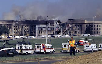 394422 05: Smoke And Flames Rise Over The Pentagon At About 10 A.M. Est September 11, 2001 Following A Suspected Terrorist Crash Of A Hijacked Commercial Airliner Into The South Side Of The Pentagon In Arlington, Va. The Attack Came At Approximately 9:40 A.M. As The Plane, Originating From Washington D.C.'s Dulles Airport, Was Flown Into The Southern Side Of The Building.  (Photo By U.S. Navy/Getty Images)