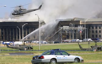 394262 04: Smoke comes out from the Southwest E-ring of the Pentagon building September 11, 2001 in Arlington, Va., after a plane crashed into the building and set off a huge explosion. (Photo by Alex Wong/Getty Images)