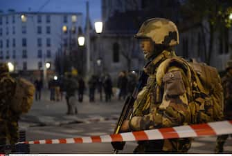 French police and special forces launch operation to storm Saint-Denis flat containing up to six Paris terrorist. Mastermind behind Friday's massacres, Abdelhamid Abaaoud, 27, believed to be inside the Paris apartment. Female suicide bomber detonated explosive vest after firing on police while one suspect killed by rooftop sniper. At least five police have been injured in the ferocious gunfight and the terrorists also shot and killed a police dog. Saint-Denis, FRANCE-18/11/2015. JEROME MARS/JDD/SIPA PRESS/JDD_1224.57/Credit:JEROME MARS/JDD/SIPA/1511181244 (SAINT DENIS - 2015-11-18, JEROME MARS/JDD/SIPA / IPA) p.s. la foto e' utilizzabile nel rispetto del contesto in cui e' stata scattata, e senza intento diffamatorio del decoro delle persone rappresentate