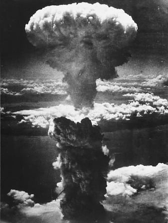 807123 376900 09: (FILE PHOTO) A dense column of smoke rises more than 60,000 feet into the air over the Japanese industrial port of Nagasaki, the result of an atomic bomb, the second ever used in warfare, August 8, 1945, from a U.S. Air Force B-29 Superfortress. (Courtesy of the National Archives/Newsmakers)