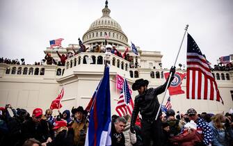 1230454306 WASHINGTON, DC - JANUARY 06: Pro-Trump supporters storm the US Capitol following a rally with President Donald Trump on January 6, 2021 in Washington, DC. Trump supporters gathered in the nation's capital today to protest the ratification of President-elect Joe Biden's Electoral College victory over President Trump in the 2020 election. (Photo by Samuel Corum/Getty Images)